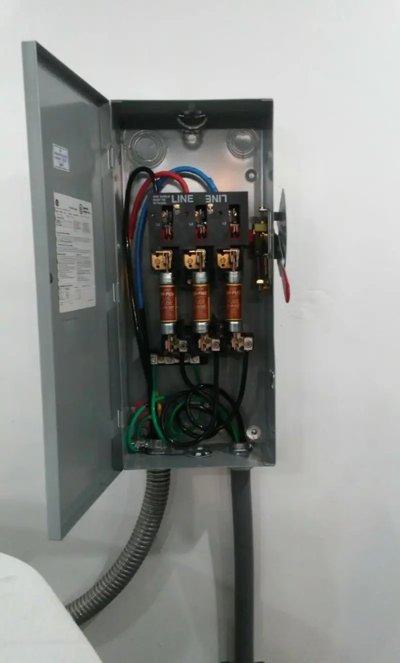 Three-phase disconnect switch installed for Smoke Detector Installation in Chatfield